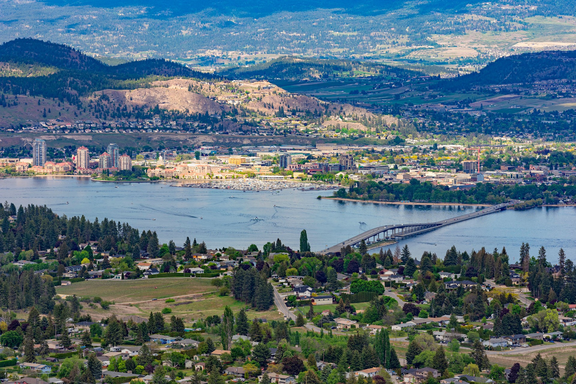 View of Kelowna, Okanagan Lake and the W R Bennett Bridge from Mount Boucherie in West Kelowna British Columbia Canada